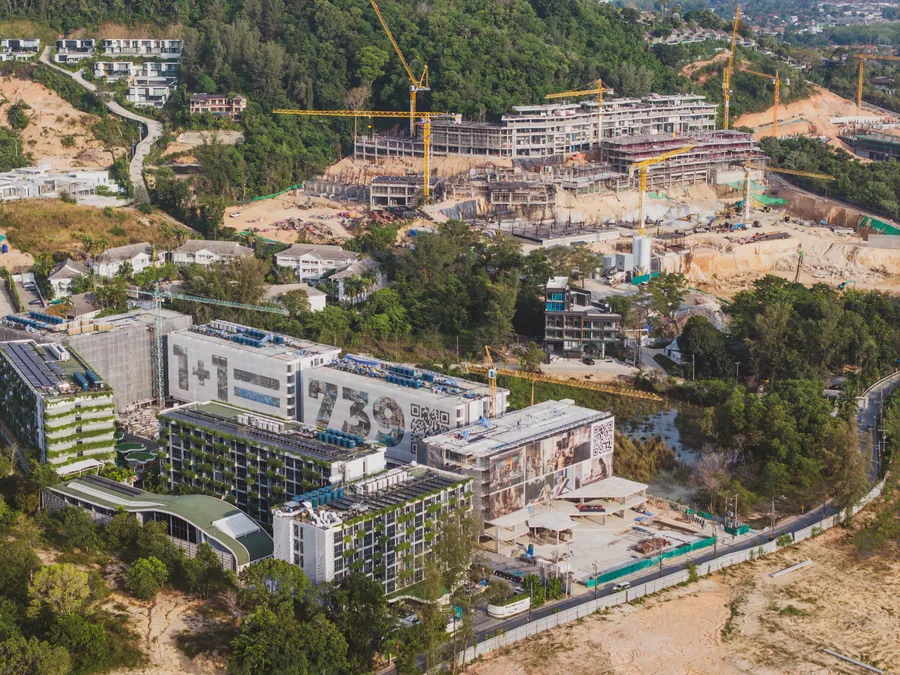 Drone footage of residential projects under construction in Layan, Phuket, at different stages of completion.