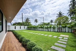 Corner house with a large green plot in Paklok area, Phuket