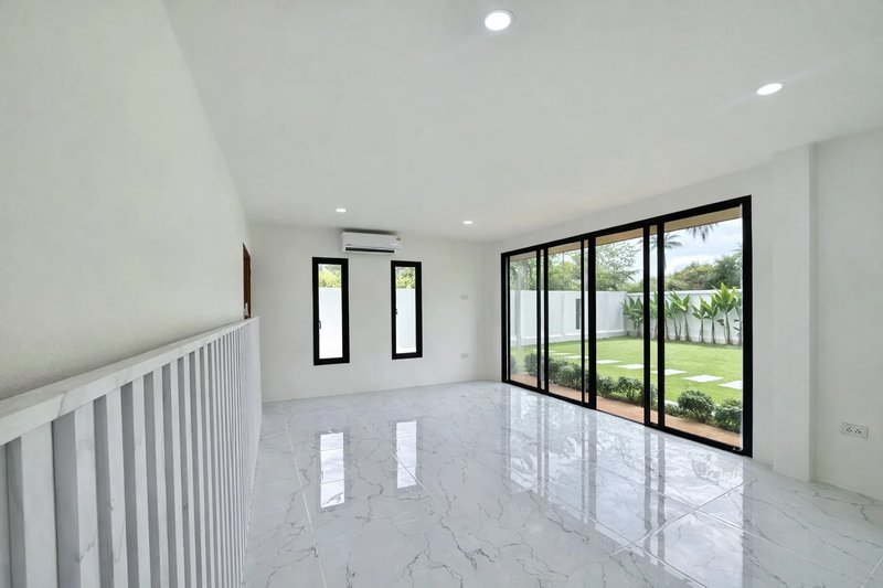 Corner house with a large green plot in Paklok area, Phuket