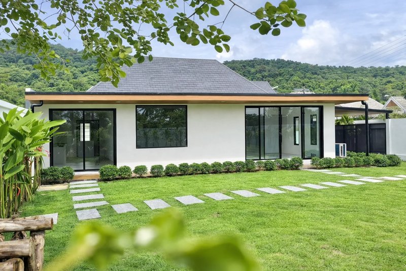 Corner house with a large green plot in Paklok area, Phuket